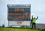 9 May 2021; Corrigan Park steward Conor McCaffrey celebrates beside the scoreboard following the Allianz Hurling League Division 1 Group B Round 1 match between Antrim and Clare at Corrigan Park in Belfast, Antrim. Photo by David Fitzgerald/Sportsfile