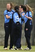 9 May 2021; Jane Maguire of Typhoons, second right, celebrates with team-mates including Orla Prendergast, left, after catching out Shauna Kavanagh of Scorchers during the third match of the Arachas Super 50 Cup between Scorchers and Typhoons at Rush Cricket Club in Rush, Dublin. Photo by Harry Murphy/Sportsfile