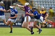 9 May 2021; Rory O'Connor of Wexford is fouled by Lee Cleere of Laois resulting in a penalty for Wexford and a yellow card and sin binning for Cleereduring the Allianz Hurling League Division 1 Group B Round 1 match between Wexford and Laois at Chadwicks Wexford Park in Wexford. Photo by Brendan Moran/Sportsfile