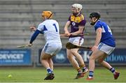9 May 2021; Laois goalkeeper Enda Rowland saves a shot from David Dunne of Wexford during the Allianz Hurling League Division 1 Group B Round 1 match between Wexford and Laois at Chadwicks Wexford Park in Wexford. Photo by Brendan Moran/Sportsfile