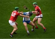 9 May 2021; Iarlaith Daly of Waterford in action against Seamus Harnedy, left, and Robbie O’Flynn of Cork during the Allianz Hurling League Division 1 Group A Round 1 match between Cork and Waterford at Páirc Ui Chaoimh in Cork. Photo by Stephen McCarthy/Sportsfile