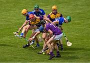 9 May 2021; Players from both sides, including Conor Hearne, Kevin Foley, Conal Flood and Simon Donohoe of Wexford and Charlie Dwyer, Paddy Purcell and Roddy King of Laois compete for possession of the sliotar during the Allianz Hurling League Division 1 Group B Round 1 match between Wexford and Laois at Chadwicks Wexford Park in Wexford. Photo by Brendan Moran/Sportsfile