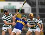 8 May 2021; Cathal Barrett of Tipperary prepares to clear under pressure from Conor Boylan, left, and Tom Morrisey during the Allianz Hurling League Division 1 Group A Round 1 match between Limerick and Tipperary at LIT Gaelic Grounds in Limerick. Photo by Ray McManus/Sportsfile