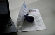 9 May 2021; A general view of of a journalists laptop, mouse, pen and teamsheet before the Allianz Hurling League Division 1 Group A Round 1 match between Cork and Waterford at Páirc Ui Chaoimh in Cork. Photo by Stephen McCarthy/Sportsfile