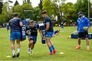 10 May 2021; Contact skills coach Hugh Hogan, works with players from left, Vakh Abdaladze, Scott Penny and Dan Sheehan during Leinster Rugby squad training at UCD in Dublin. Photo by Ramsey Cardy/Sportsfile