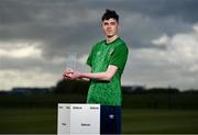 12 May 2021; Announced as one of the first ever representatives of the official Republic of Ireland eFootball team today was newly crowned eLOI champion Tyrone Ryan with the trophy at the FAI Headquarters in Abbotstown, Dublin. Photo by Harry Murphy/Sportsfile