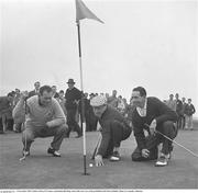 4 November 1961; Golfer Christy O’Connor, commedian Bob Hope and Golfer Joe Carr at Royal Dublin Golf Club in Dublin. Photo by Connolly Collection