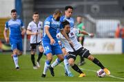 14 May 2021; Han Jeongwoo of Dundalk in action against Ethan Boyle, left, and Will Seymore of Finn Harps during the SSE Airtricity League Premier Division match between Finn Harps and Dundalk at Finn Park in Ballybofey, Donegal. Photo by Stephen McCarthy/Sportsfile