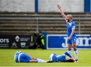 14 May 2021; Mark Coyle calls for medical attention for his Finn Harps team-mates Johnny Dunleavy and Adam Foley, left, during the SSE Airtricity League Premier Division match between Finn Harps and Dundalk at Finn Park in Ballybofey, Donegal. Photo by Stephen McCarthy/Sportsfile
