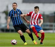 14 May 2021; Kurtis Byrne of Athlone Town in action against Edward McCarthy of Treaty United during the SSE Airtricity League First Division match between Treaty United and Athlone Town at Markets Field in Limerick. Photo by Michael P Ryan/Sportsfile