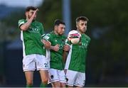 14 May 2021; Cork City players, from left, Gordon Walker, Jack Baxter, Jack Walsh in the wall as a free-kick by Evan Weir of UCD goes wide during the SSE Airtricity League First Division match between UCD and Cork City at UCD Bowl in Belfield, Dublin. Photo by Piaras Ó Mídheach/Sportsfile