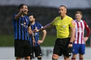 14 May 2021; Kurtis Byrne of Athlone Town with referee Alan Patchell during the SSE Airtricity League First Division match between Treaty United and Athlone Town at Markets Field in Limerick. Photo by Michael P Ryan/Sportsfile