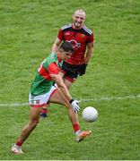 15 May 2021; Tommy Conroy of Mayo in action against Patrick Murdock of Down during the Allianz Football League Division 2 North Round 1 match between Mayo and Down at Elverys MacHale Park in Castlebar, Mayo. Photo by Piaras Ó Mídheach/Sportsfile