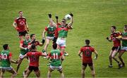 15 May 2021; Matthew Ruane of Mayo gets to the ball ahead of Ryan McEvoy of Down during the Allianz Football League Division 2 North Round 1 match between Mayo and Down at Elverys MacHale Park in Castlebar, Mayo. Photo by Piaras Ó Mídheach/Sportsfile