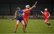 15 May 2021; Emma Flanagan of Cork in action against Jill Ann Quirke of Tipperary during the Littlewoods Ireland National Camogie League Division 2 Group 2 match between Tipperary and Cork at Drom-Inch in Tipperary. Photo by David Fitzgerald/Sportsfile