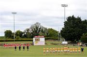 15 May 2021; The Louth and Antrim teams during the playing of the National Anthem prior to the Allianz Football League Division 4 North Round 1 match between Louth and Antrim at Geraldines Club in Haggardstown, Louth. Photo by Ramsey Cardy/Sportsfile
