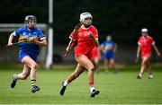 15 May 2021; Ali Smith of Cork in action against Ciara Ryan of Tipperary during the Littlewoods Ireland National Camogie League Division 2 Group 2 match between Tipperary and Cork at Drom-Inch in Tipperary. Photo by David Fitzgerald/Sportsfile