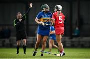 15 May 2021; Sinead Meagher of Tipperary and Ashling Moloney of Cork during the Littlewoods Ireland National Camogie League Division 2 Group 2 match between Tipperary and Cork at Drom-Inch in Tipperary. Photo by David Fitzgerald/Sportsfile