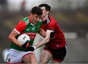 15 May 2021; Fionn McDonagh of Mayo in action against James Guinness of Down during the Allianz Football League Division 2 North Round 1 match between Mayo and Down at Elverys MacHale Park in Castlebar, Mayo. Photo by Piaras Ó Mídheach/Sportsfile
