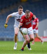 15 May 2021; Ruairí Deane of Cork is tackled by Kevin Feely of Kildare during the Allianz Football League Division 2 South Round 1 match between Cork and Kildare at Semple Stadium in Thurles, Tipperary. Photo by Ray McManus/Sportsfile