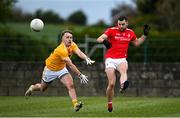 15 May 2021; Dermot Campbell of Louth in action against Odhran Eastwood of Antrim during the Allianz Football League Division 4 North Round 1 match between Louth and Antrim at Geraldines Club in Haggardstown, Louth. Photo by Ramsey Cardy/Sportsfile