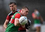 15 May 2021; Bryan Walsh of Mayo in action against Barry O'Hagan of Down during the Allianz Football League Division 2 North Round 1 match between Mayo and Down at Elverys MacHale Park in Castlebar, Mayo. Photo by Piaras Ó Mídheach/Sportsfile