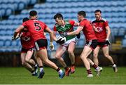 15 May 2021; Cillian O'Connor of Mayo is tackled by Jonny Flynn of Down during the Allianz Football League Division 2 North Round 1 match between Mayo and Down at Elverys MacHale Park in Castlebar, Mayo. Photo by Piaras Ó Mídheach/Sportsfile