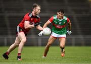 15 May 2021; Gerard McGovern of Down in action against Tommy Conroy of Mayo during the Allianz Football League Division 2 North Round 1 match between Mayo and Down at Elverys MacHale Park in Castlebar, Mayo. Photo by Piaras Ó Mídheach/Sportsfile