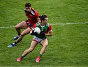 15 May 2021; Oisín Mullin of Mayo in action against Pierce Laverty of Down during the Allianz Football League Division 2 North Round 1 match between Mayo and Down at Elverys MacHale Park in Castlebar, Mayo. Photo by Piaras Ó Mídheach/Sportsfile