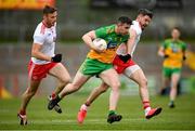 15 May 2021; Patrick McBrearty of Donegal in action against Matthew Donnelly of Tyrone during the Allianz Football League Division 1 North Round 1 match between Tyrone and Donegal at Healy Park in Omagh, Tyrone. Photo by Stephen McCarthy/Sportsfile