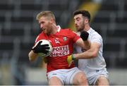 15 May 2021; Ruairí Deane of Cork in action against Kevin Flynn of Kildare during the Allianz Football League Division 2 South Round 1 match between Cork and Kildare at Semple Stadium in Thurles, Tipperary. Photo by Daire Brennan/Sportsfile