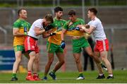 15 May 2021; Donegal players, from left, Neil McGee, Brendan McCole and Peadar Mogan tussle with Michael O'Neill, left, and Conor Meyler of Tyrone during the Allianz Football League Division 1 North Round 1 match between Tyrone and Donegal at Healy Park in Omagh, Tyrone. Photo by Stephen McCarthy/Sportsfile