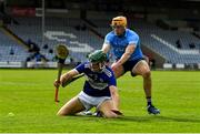 15 May 2021; Sean Downey of Laois in action against Eamonn Dillon of Dublin during the Allianz Hurling League Division 1 Group B Round 2 match between Laois and Dublin at MW Hire O'Moore Park in Portlaoise, Laois. Photo by Eóin Noonan/Sportsfile