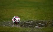 15 May 2021; The match ball sits in a puddle pitchside before the SSE Airtricity League Premier Division match between Longford Town and Bohemians at Bishopsgate in Longford. Photo by Ben McShane/Sportsfile