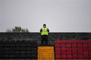 15 May 2021; A steward looks on before the SSE Airtricity League Premier Division match between Longford Town and Bohemians at Bishopsgate in Longford. Photo by Ben McShane/Sportsfile