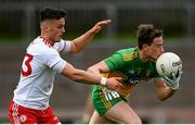 15 May 2021; Ciaran Thompson of Donegal and Michael McKernan of Tyrone during the Allianz Football League Division 1 North Round 1 match between Tyrone and Donegal at Healy Park in Omagh, Tyrone. Photo by Stephen McCarthy/Sportsfile