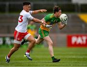 15 May 2021; Ciaran Thompson of Donegal and Michael McKernan of Tyrone during the Allianz Football League Division 1 North Round 1 match between Tyrone and Donegal at Healy Park in Omagh, Tyrone. Photo by Stephen McCarthy/Sportsfile