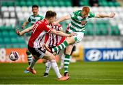 15 May 2021; Rory Gaffney of Shamrock Rovers takes a shot, under pressure from Cameron McJannet of Derry City, during the SSE Airtricity League Premier Division match between Shamrock Rovers and Derry City at Tallaght Stadium in Dublin. Photo by Seb Daly/Sportsfile