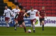 15 May 2021; Ross Tierney of Bohemians in action against Aodh Dervin of Longford Town during the SSE Airtricity League Premier Division match between Longford Town and Bohemians at Bishopsgate in Longford. Photo by Ben McShane/Sportsfile
