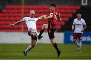 15 May 2021; Georgie Kelly of Bohemians in action against Aaron Bolger of Longford Town during the SSE Airtricity League Premier Division match between Longford Town and Bohemians at Bishopsgate in Longford. Photo by Ben McShane/Sportsfile
