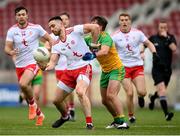 15 May 2021; Padraig Hampsey of Tyrone in action against Peadar Mogan of Donegal during the Allianz Football League Division 1 North Round 1 match between Tyrone and Donegal at Healy Park in Omagh, Tyrone. Photo by Stephen McCarthy/Sportsfile