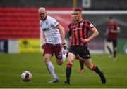 15 May 2021; Michael McDonnell of Longford Town in action against Georgie Kelly of Bohemians during the SSE Airtricity League Premier Division match between Longford Town and Bohemians at Bishopsgate in Longford. Photo by Ben McShane/Sportsfile