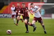15 May 2021; Ross Tierney of Bohemians in action against Dean Zambra of Longford Town during the SSE Airtricity League Premier Division match between Longford Town and Bohemians at Bishopsgate in Longford. Photo by Ben McShane/Sportsfile