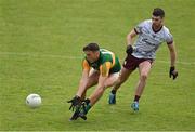 15 May 2021; David Clifford of Kerry collects a pass ahead of Sean Mulkerrin of Galway during the Allianz Football League Division 1 South Round 1 match between Kerry and Galway at Austin Stack Park in Tralee, Kerry. Photo by Brendan Moran/Sportsfile