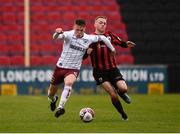 15 May 2021; Andy Lyons of Bohemians in action against Dean Byrne of Longford Town during the SSE Airtricity League Premier Division match between Longford Town and Bohemians at Bishopsgate in Longford. Photo by Ben McShane/Sportsfile