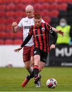15 May 2021; Aodh Dervin of Longford Town in action against Georgie Kelly of Bohemians during the SSE Airtricity League Premier Division match between Longford Town and Bohemians at Bishopsgate in Longford. Photo by Ben McShane/Sportsfile