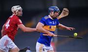 15 May 2021; Jason Forde of Tipperary in action against Seán O'Leary Hayes of Cork during the Allianz Hurling League Division 1 Group A Round 2 match between Tipperary and Cork at Semple Stadium in Thurles, Tipperary. Photo by Ray McManus/Sportsfile
