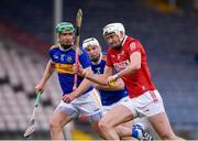 15 May 2021; Tim O’Mahony of Cork in action against Noel McGrath of Tipperary during the Allianz Hurling League Division 1 Group A Round 2 match between Tipperary and Cork at Semple Stadium in Thurles, Tipperary. Photo by Daire Brennan/Sportsfile