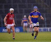 15 May 2021; John McGrath of Tipperary in action against Luke Meade of Cork during the Allianz Hurling League Division 1 Group A Round 2 match between Tipperary and Cork at Semple Stadium in Thurles, Tipperary. Photo by Ray McManus/Sportsfile