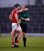 15 May 2021; Referee Johnny Murphy demonstrates to Niall Cashman of Cork why he is about to issue him with a yellow card during the Allianz Hurling League Division 1 Group A Round 2 match between Tipperary and Cork at Semple Stadium in Thurles, Tipperary. Photo by Ray McManus/Sportsfile